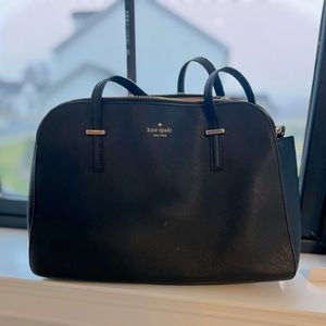 Kate Spade bag. Medium/large size, can fit an Apple laptop in it.